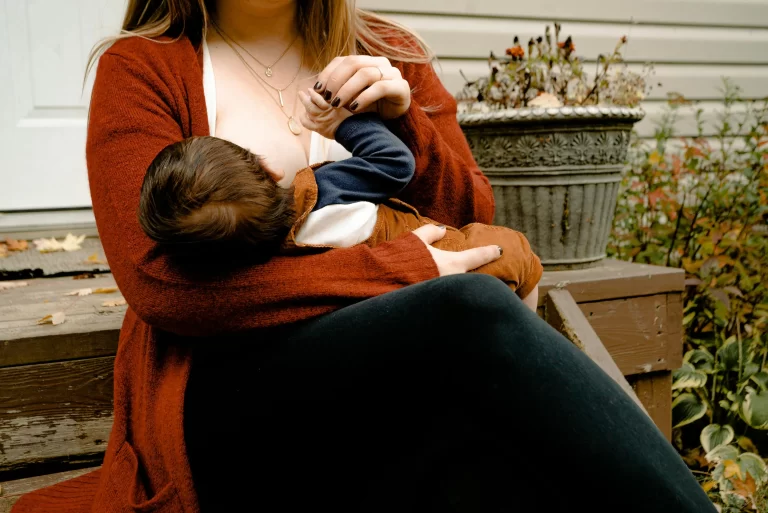 A mother breastfeeding her baby.