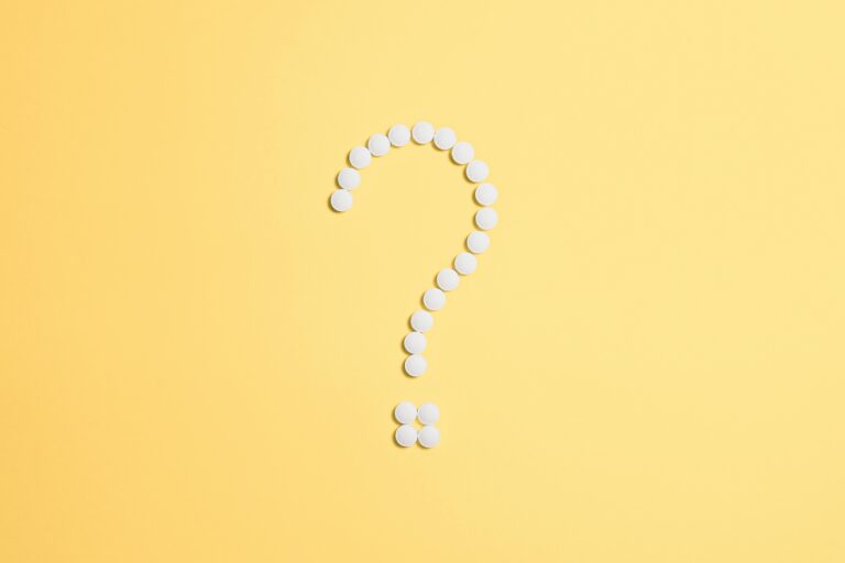 Question mark made of pills