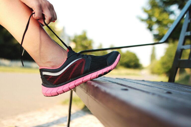 Athlete tying their shoes