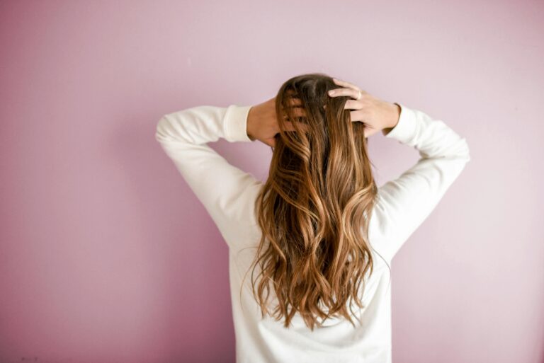 Person holding their hair