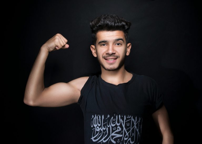 Man flexing his arm