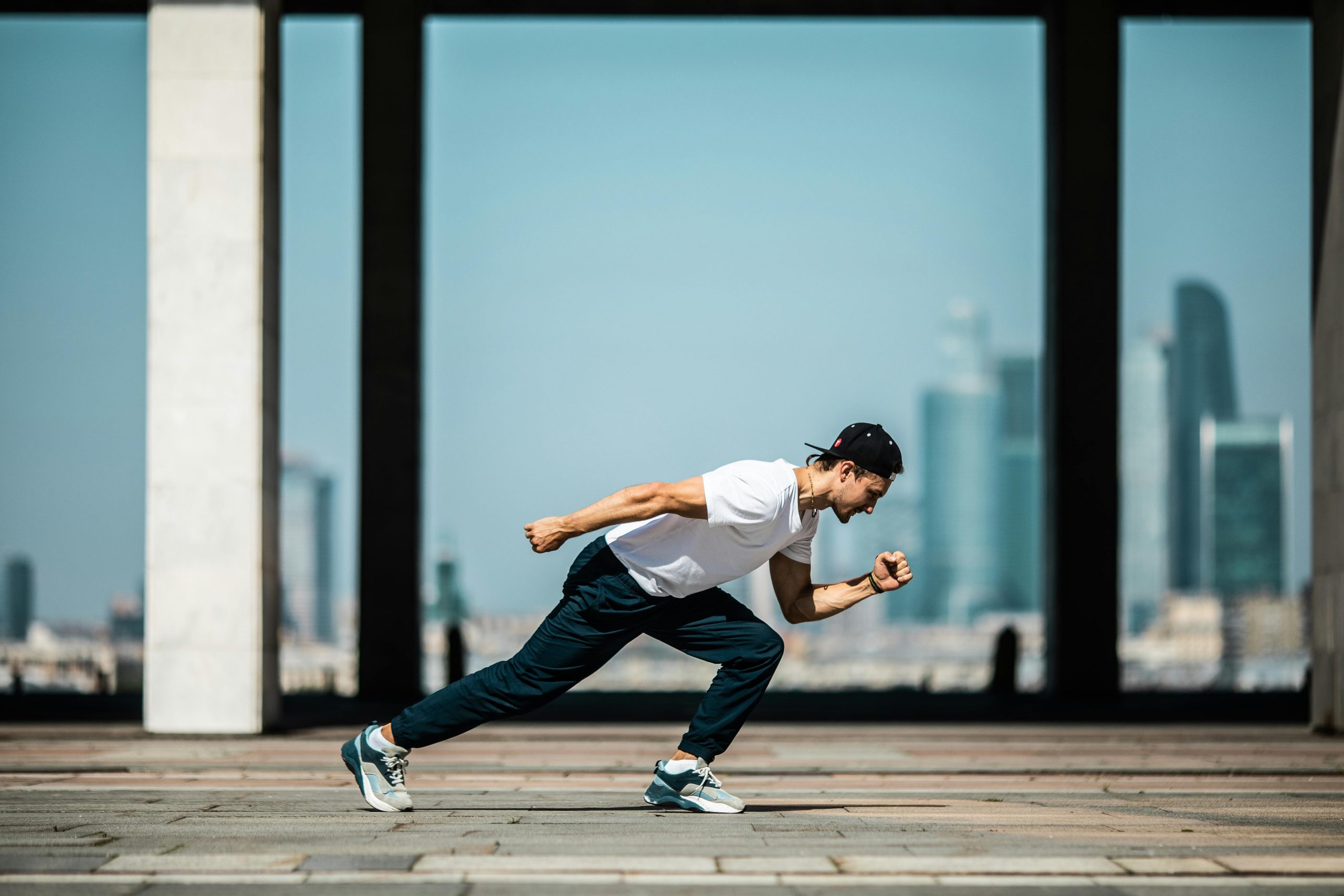 Man running on a sidewalk