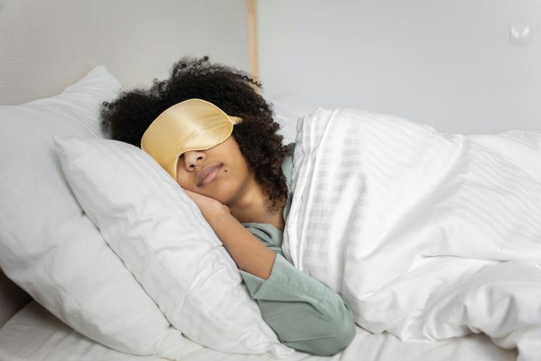 Woman sleeping in a bed